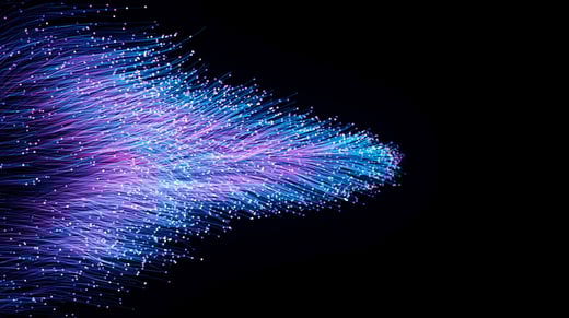 Vibrant array of blue and purple data strands