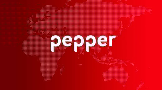 Pepper group logo over a red background of the world map.