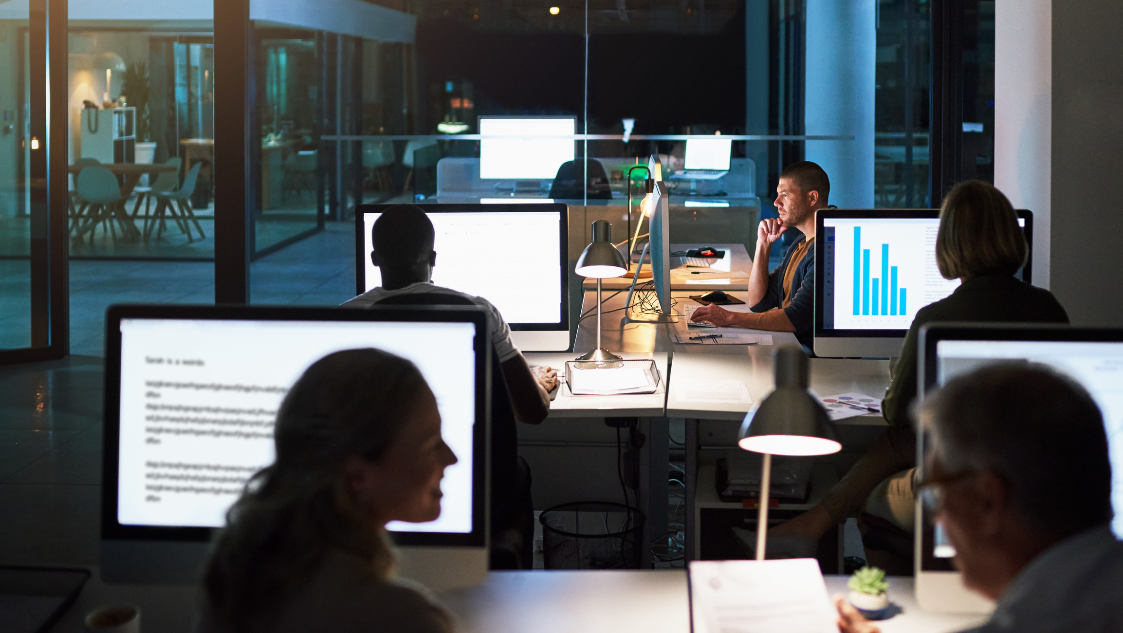 Business people working late in the office