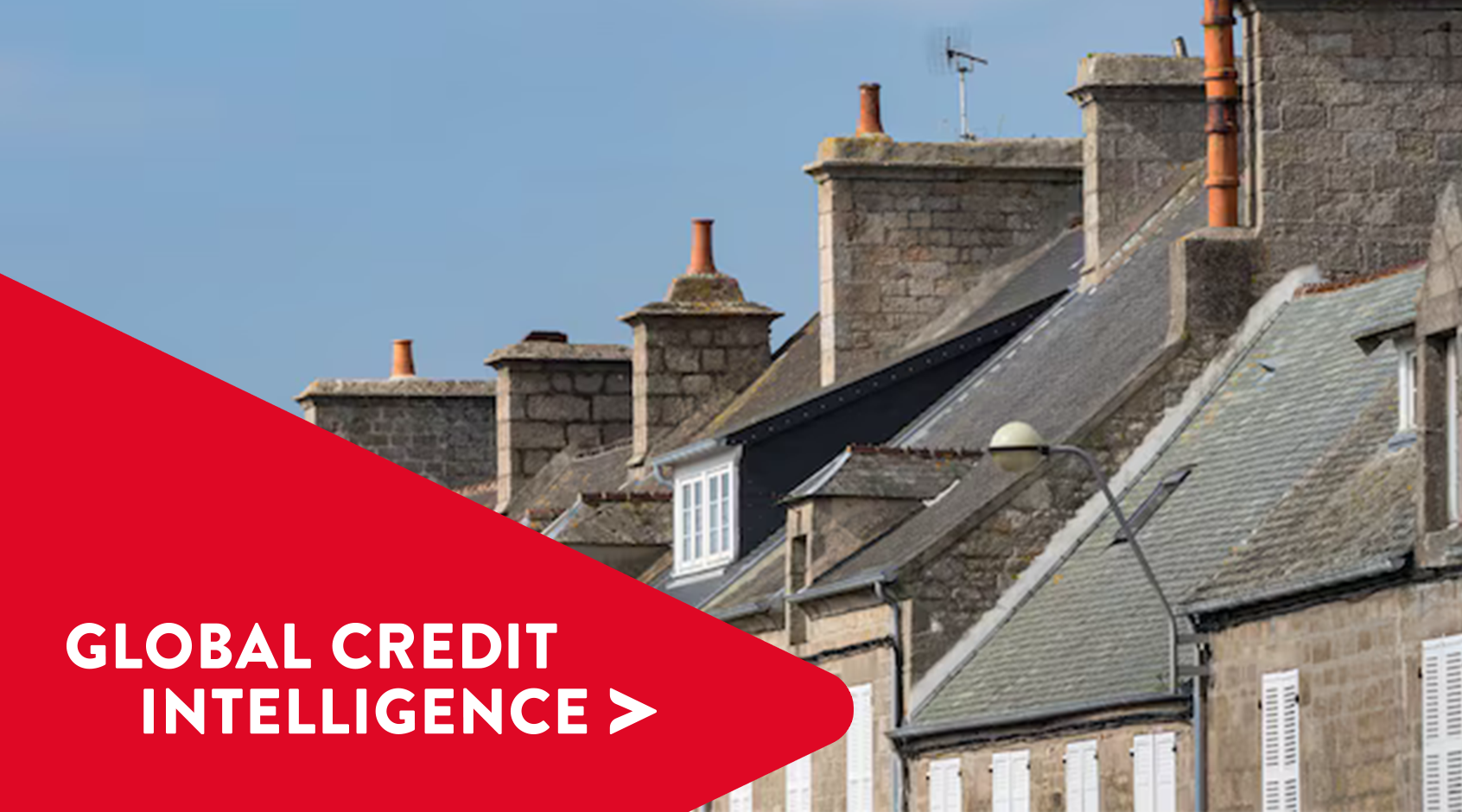 Row of stone buildings symbolizing financial stability, credit intelligence, and trusted risk management solutions with a red banner overlay reading 'Global Credit Intelligence.